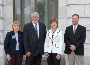 For their outstanding efforts in designing and implementing the Direct Loan System/Loan Making, which greatly improved the operational efficiency of the Direct Loan Program, an Outstanding Team Accomplishment Award was presented to the Direct Loan System/Loan Making Task Force: (Left to Right) Kathleen Miller, Glen Keppy, Teresa Lasseter, Michael Matthews. (Not pictured: Ray Bartholomew, JoDee Bryant, Georgia Jenness, Tammy Phelps, Sharon Teston, Pam Polson and Lisa Reynolds.)