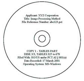 Picture of a compact disc containing a tables part and labeled with the required information listed above.