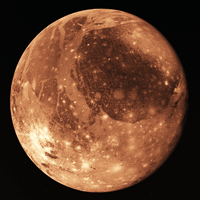 This shows an entire hemisphere of Ganymede. The prominent dark region, called Galileo Regio, is about 3,210 km in diameter. The bright spots are relative recent impact craters. Part of the Galileo Regio may be covered with a bright frost.