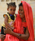 Photo of a mother holding her child, taken in Senegal.