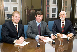 (L-R) LIA Education Director, Rich Greene, OSHA's then-Acting Assistant Secretary, Jonathan L. Snare, and LIA Executive Director, Peter Baker sign national Alliance on August 9, 2005