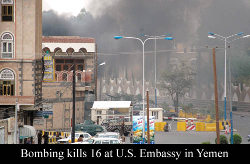 Smoke rises Wednesday from the U.S. Embassy in San’a, Yemen, after a car bomb targeting the embassy hit the front gate of the compound.