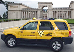 Photo of a Yellow Cab Cooperative hybrid electric sport utility vehicle (SUV) taxi.