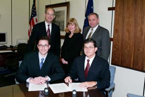 Front row L-R: CCAR's S/P2 Information Officer, Sean Ochester, and OSHA's then-Assistant Secretary, John Henshaw. Back row L-R: CCAR's Vice Chairman, Lin Peacock, CCAR's Outreach Specialist, Dee Riegle Torres, and CCAR's Chairman, Lirel Holt.