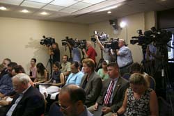 Reporters at a NOAA news conference at the National Press Club in Washington, D.C., on the ozone hole then and now.