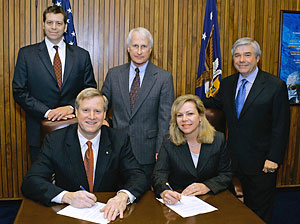 (front row) Edwin G. Foulke, Jr., Assistant Secretary, USDOL-OSHA; Celeste Powers, Executive Director, ILMA; (back row, L-R) Adam Cramer, Government Relations and Regulatory Affairs Counsel, ILMA; John Burke, Chair, Safety, Health, Environmental, and Regulatory Affairs Committee, ILMA; Jeffrey Leiter, General Counsel, ILMA at the national Alliance renewal signing on May 13, 2008