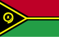Flag of Vanuatu is two equal horizontal bands of red (top) and green with a black isosceles triangle (based on the hoist side) all separated by a black-edged yellow stripe in the shape of a horizontal Y (the two points of the Y face the hoist side and enclose the triangle); centered in the triangle is a boar's tusk encircling two crossed namele leaves, all in yellow.