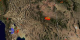 This animation shows a zoom out from the Southwestern US
while fires detected between 5-1-2002 and 8-20-2002 are displayed. A clock inset indicates the date.