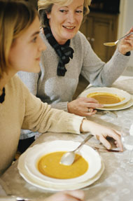 mom and daughter eating