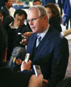 Assistant Secretary Christopher R. Hill briefs journalists at the St. Regis hotel in Beijing.  [© AP Images]