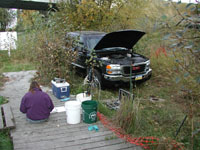 USGS scientists studied the natural attenuation of a chlorinated-solvents plume at an old dry-cleaning facility near Soldonta, AK. Here ground water is being sampled to assess redox conditions in the plume