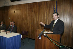 OSHA's then-Assistant Secretary, John Henshaw; welcomes the members of the Roadway Work Zone Safety and Health Coalition to the November 18, 2003 Alliance signing.