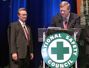 OSHA's Assistant Secretary, Edwin G. Foulke, Jr., and NSC's President and CEO, Alan C. McMillan, sign the OSHA/NSC Alliance renewal agreement on October 15, 2007 during the National Safety Congress and EXPO in Chicago, Illinois