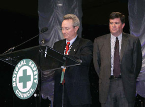 OSHA's then-Acting Assistant Secretary, Jonathan L. Snare, and NSC's President and CEO, Alan McMillan, sign the OSHA-NSC Alliance renewal agreement on September 21, 2005 during the National Safety Congress