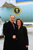 President George W. Bush met Gloria Grandone upon arrival in Appleton, Wisconsin, on Tuesday, March 30, 2004.  Grandone is an active volunteer with both the Doug and Carla Salmon Foundation and Community Action Program (CAP) Services.