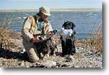 Pictures of a man hunting birds with his dog