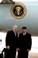 President George W. Bush met Nathaniel Foster upon arrival in Knoxville, Tennessee, on Thursday, January 8, 2004.  Foster has been an active volunteer with 100 Black Men of Greater Knoxville, Inc. for the past ten years.