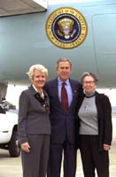 President George W. Bush met Mary Anne Selber and Jean Sayres upon arrival in Shreveport, Louisiana, on Tuesday, December 3, 2002. Selber and Sayres helped establish Providence House, a residential development center for homeless families with children. 