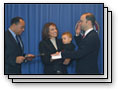 Click to see photos of the Commissioner's 2002 Swearing-in Ceremony