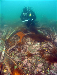 NOAA Archaeologist Hans Van Tilburg documents the Hassler's boiler face.