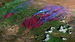 Landsat imagery for the Rodeo-Chediski fire in central Arizona on June 21, 2002.  The imagery is enhanced with thermal data to bring out the fire regions.
