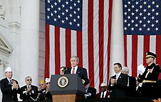 President Bush addresses the crowd at the 2006 Veterans Day National Ceremony at Arlington National Cemetery, November 11, 2006.