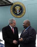President George W. Bush presented the President’s Volunteer Service Award to Marvin Bardo upon arrival at the airport in Indianapolis, Indiana, on Friday, March 24, 2006.  Bardo is a volunteer with the Kappa League mentoring program.  To thank them for making a difference in the lives of others, President Bush has met with more than 480 individuals around the country, like Bardo, since March 2002.