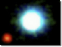 Infrared image of a brown dwarf (center) and its planet-mass companion (ESO image)