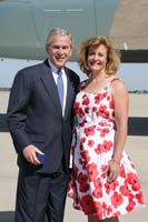 President George W. Bush presented the President’s Volunteer Service Award to Amy Petrenko upon arrival at Pope Air Force Base, North Carolina, on Thursday, May 22, 2008.  Petrenko, an Army spouse, is a volunteer with the National Military Family Association, the Child Advocacy Center of Cumberland County and other community organizations. To thank them for making a difference in the lives of others, President Bush honors a local volunteer when he travels throughout the United States.  He has met with more than 600 volunteers, like Petrenko, since March 2002.