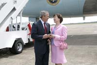 President George W. Bush presented the President’s Volunteer Service Award to Dorothy Paterson upon arrival in Houston, Texas, on Tuesday, April 26, 2005.  Paterson is a volunteer with several community organizations including Girl Scouts of San Jacinto Council, The Susan G. Komen Breast Cancer Foundation, the Pink Ribbons Project, and M.D. Anderson Cancer Center in Houston.  To thank them for making a difference in the lives of others, President Bush has met with more than 400 individuals around the country, like Paterson, since March 2002.