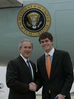 President George W. Bush presented the President’s Volunteer Service Award to Tulsa native William “B.J.” O’Connor upon arrival at the airport in Enid, Oklahoma, on Saturday, May 6, 2006.  O’Connor, a junior at Oklahoma State University, is a volunteer with Campus Crusade for Christ and a variety of Oklahoma State University community service projects.  To thank them for making a difference in the lives of others, President Bush has met with more than 490 individuals around the country, like O’Connor, since March 2002.