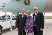 President George W. Bush presented the President’s Volunteer Service Award to Doris Hickman upon arrival at the airport in Columbia, Missouri, on Tuesday, April 11, 2006.  Hickman is a volunteer with the Foster Grandparent Program through Central Missouri Community Action.  To thank them for making a difference in the lives of others, President Bush has met with more than 480 individuals around the country, like Hickman, since March 2002.