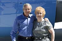 President George W. Bush met Bernice Young upon arrival in Albuquerque, New Mexico, on Thursday, August 26, 2004.  Young, 71, is an active volunteer at Children’s Hospital of New Mexico. 