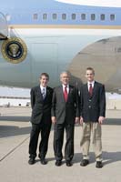 President George W. Bush presented the President’s Volunteer Service Award to Bradley Fisher, 17, and Taylor Mayes, 17, upon arrival at the airport in Kansas City, Missouri, on Friday, September 8, 2006.  Fisher and Mayes, seniors at Smithville High School, are volunteers with Youth with Vision. To thank them for making a difference in the lives of others, President Bush honors local volunteers, called USA Freedom Corps Greeters, when he travels throughout the United States.  President Bush has met with more than 500 individuals around the country, like Fisher and Mayes, since March 2002.