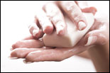 Photo: Washing  hands with soap and water.