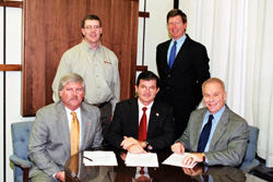 Alliance signing with Washington Group International (2002, December).