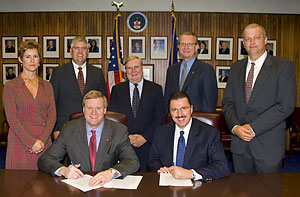 (First row L-R) Edwin G. Foulke, Jr., Assistant Secretary, USDOL-OSHA; Dennis Slater, President, AEM; (Second row L-R) Anne Forristall Luke, Vice President of Government Relations, AEM; Darrin Drollinger, Vice President, Statistics, Technical and Safety Services, AEM; Richard Dressler, Assistant Director, Technical and Safety Services, AEM; Mike Pankonin, Assistant Director, Technical and Safety Services, AEM; Erik J. Ramsey, Engineer, Sellick Equipment Limited; at the national Alliance agreement signing on October 1, 2007