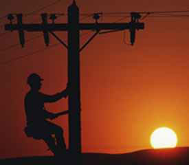 Man on Utility Pole