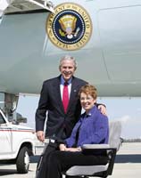 President George W. Bush presented the President’s Volunteer Service Award to Linda Feld upon arrival at the airport in Orlando, Florida, on Thursday, September 21, 2006.  Feld is a volunteer with Hospice of the Comforter.  To thank them for making a difference in the lives of others, President Bush honors a local volunteer, called a USA Freedom Corps Greeter, when he travels throughout the United States.  President Bush has met with more than 500 individuals around the country, like Feld, since March 2002.