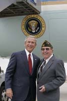 President George W. Bush presented the President’s Volunteer Service Award to Willie Hunsaker upon arrival in Salt Lake City, Utah, on Monday, August 22, 2005.  Hunsaker is a volunteer with the Veterans of Foreign Wars Post 1695 in Brigham City.   To thank them for making a difference in the lives of others, President Bush has met with nearly 450 individuals around the country, like Hunsaker, since March 2002.