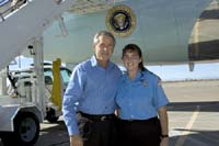 President George W. Bush met Nicole Cox upon arrival in Alamogordo, New Mexico, on Sunday, October 24, 2004.  Cox, 14, is an active volunteer with the Oro Vista Volunteer Fire Department in Alamogordo. 