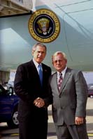President George W. Bush met Tim Mosier upon arrival in St. Louis, Missouri, on Monday, November 4. Mosier is a longtime law enforcement and emergency response professional who volunteers his time to organize and assist with citizen preparedness. 