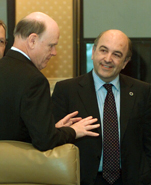 Treasury Secretary John Snow chats with Mr. Joaquin Almunia, Member of the European Commission, during the Finance Ministers' Pre-Summit held in New York.