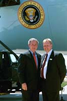 President George W. Bush met Ron Strauss upon arrival in Minneapolis, Minnesota, on Thursday, June 19, 2003. Since joining Cargill, Incorporated in 1994, Strauss has been an active volunteer in the Minneapolis community.
