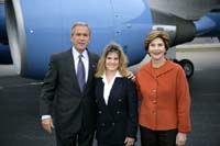 President George W. Bush met Mia Zimmerman upon arrival in Detroit, Michigan, on Wednesday, October 27, 2004.  Zimmerman is an active volunteer with Catholic Social Services' Teen Parent Partner Program.