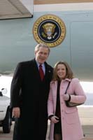 President George W. Bush met Lauren Simkulak upon arrival in Harrisburg, Pennsylvania, on Thursday, February 12, 2004.  Simkulak, 18, volunteers each week at the Penn State Milton S. Hershey Medical Center Children’s Hospital.