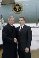 President George W. Bush met Cory Helland upon arrival in Milwaukee, Wisconsin, on Monday, November 1, 2004.  Helland, 27, is an active volunteer with Big Brothers Big Sisters of Metro Milwaukee.