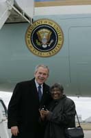 President George W. Bush presented the President’s Volunteer Service Award to Lois Hagood upon arrival at the airport in Cleveland, Ohio, on Monday, March 20, 2006.  Hagood is a volunteer with Experience Corps Cleveland.  To thank them for making a difference in the lives of others, President Bush has met with more than 475 individuals around the country, like Hagood, since March 2002.