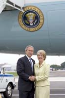President George W. Bush met Pat McDonough upon arrival in Philadelphia, Pennsylvania, on Wednesday, June 23, 2004.  McDonough is an active volunteer with Siloam in Philadelphia, providing care for HIV/AIDS patients.