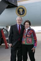 President George W. Bush presented the President’s Volunteer Service Award to Lea Fischbach upon arrival at the airport in Louisville, Kentucky, on Friday, March, 2, 2007.  Fischbach is a volunteer with The Cabbage Patch Settlement House.  To thank them for making a difference in the lives of others, President Bush honors a local volunteer when he travels throughout the United States.  President Bush has met with more than 550 individuals around the country, like Fischbach, since March 2002.